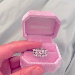 3 row, marquise and round moissanite ring.